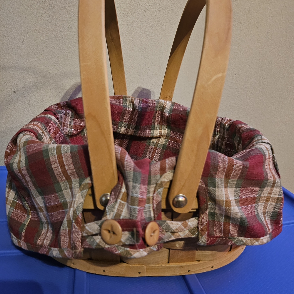 Woven basket with Longaberger plaid lining